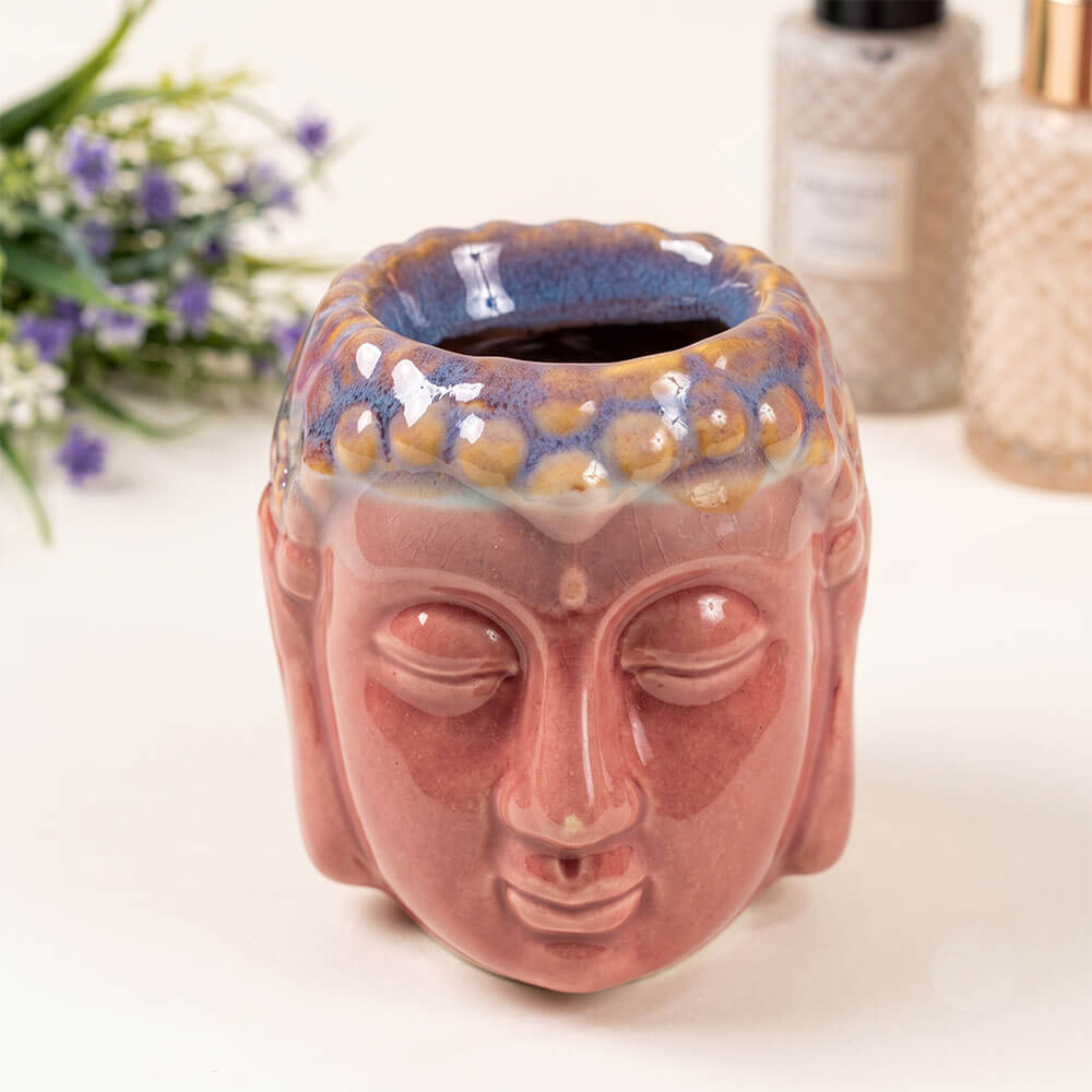Ceramiczny kominek Budda z różowo-niebieskim szkliwieniem - detal powierzchni
